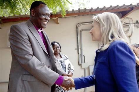Bishop Elias Taban greets Clinton in Juba